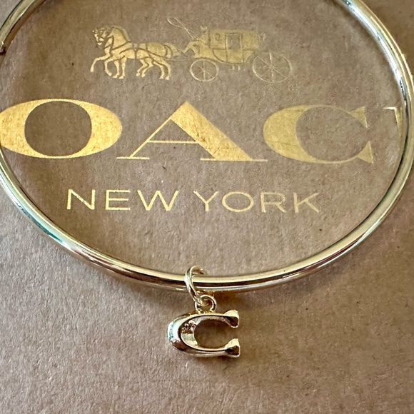 Coach Gold-tone Skinny Bangle Bracelet with Dainty Signature C Dangling Charm. - Picture 4 of 6